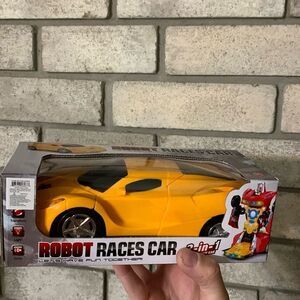 3for$20 NWT transformer yellow race car sounds plus light automatic rotation